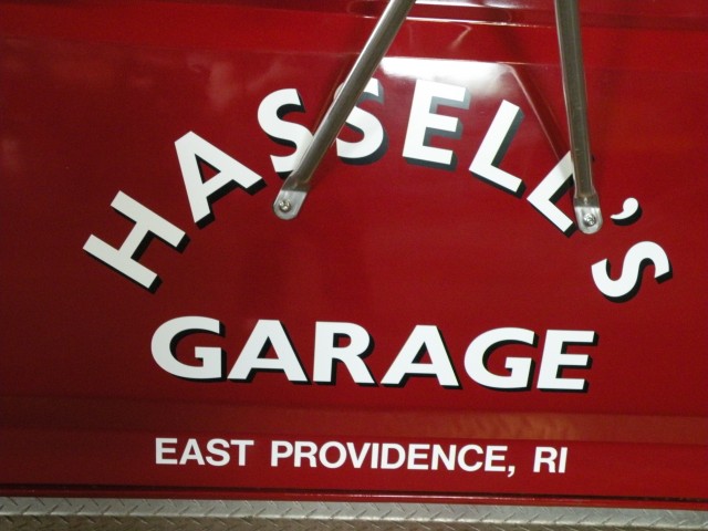 Hassell's Garage service vehicle and building